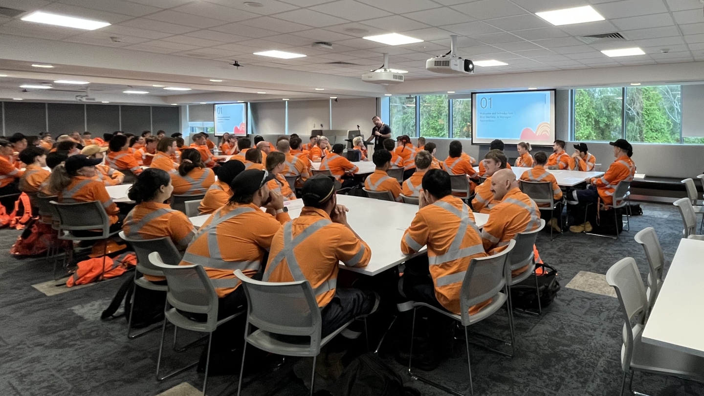 Apprentices watching a presentation